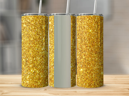Three glitter tumblers with straws on a wooden surface.