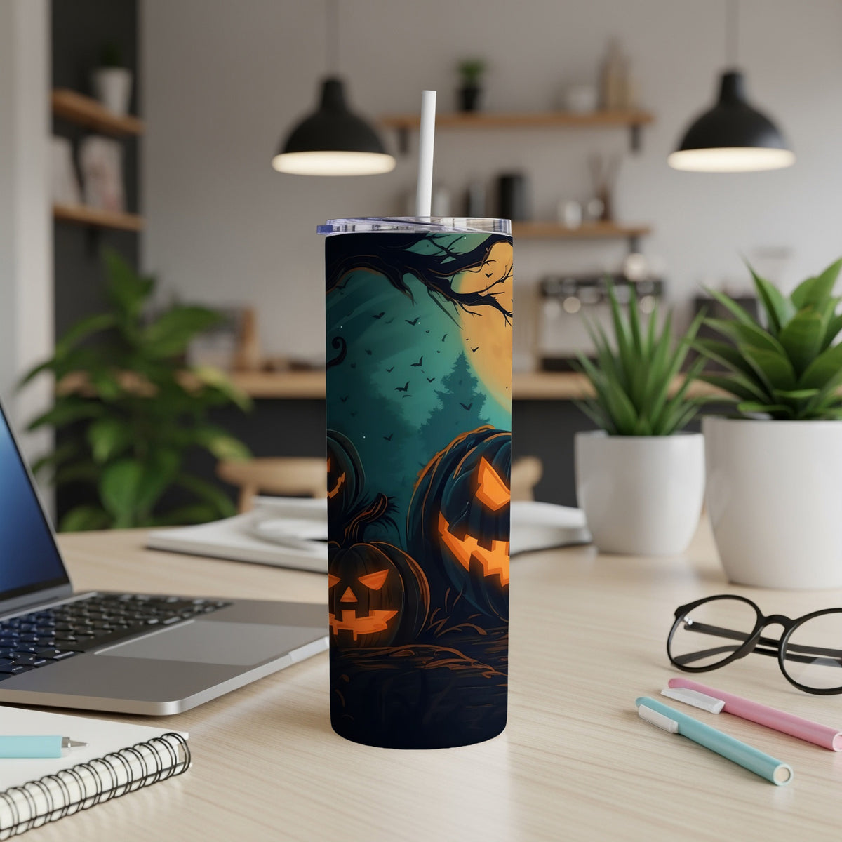 Tumbler with a Halloween scene featuring jack-o'-lanterns, bats, and a full moon.