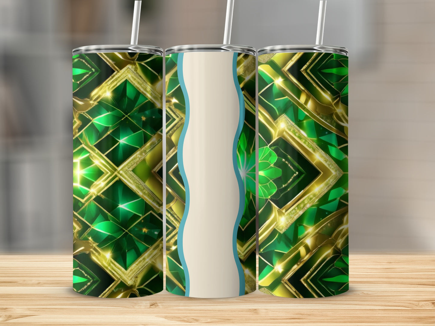 Three tumblers with a green and gold geometric pattern on a wooden surface.