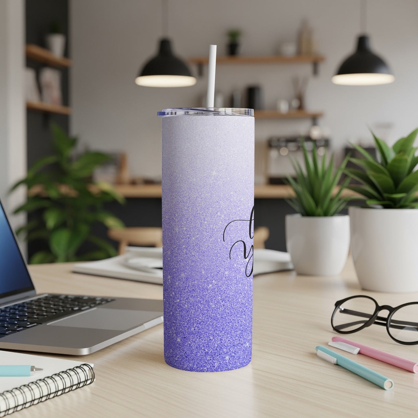 Purple glitter tumbler with "You got this" text on a desk.