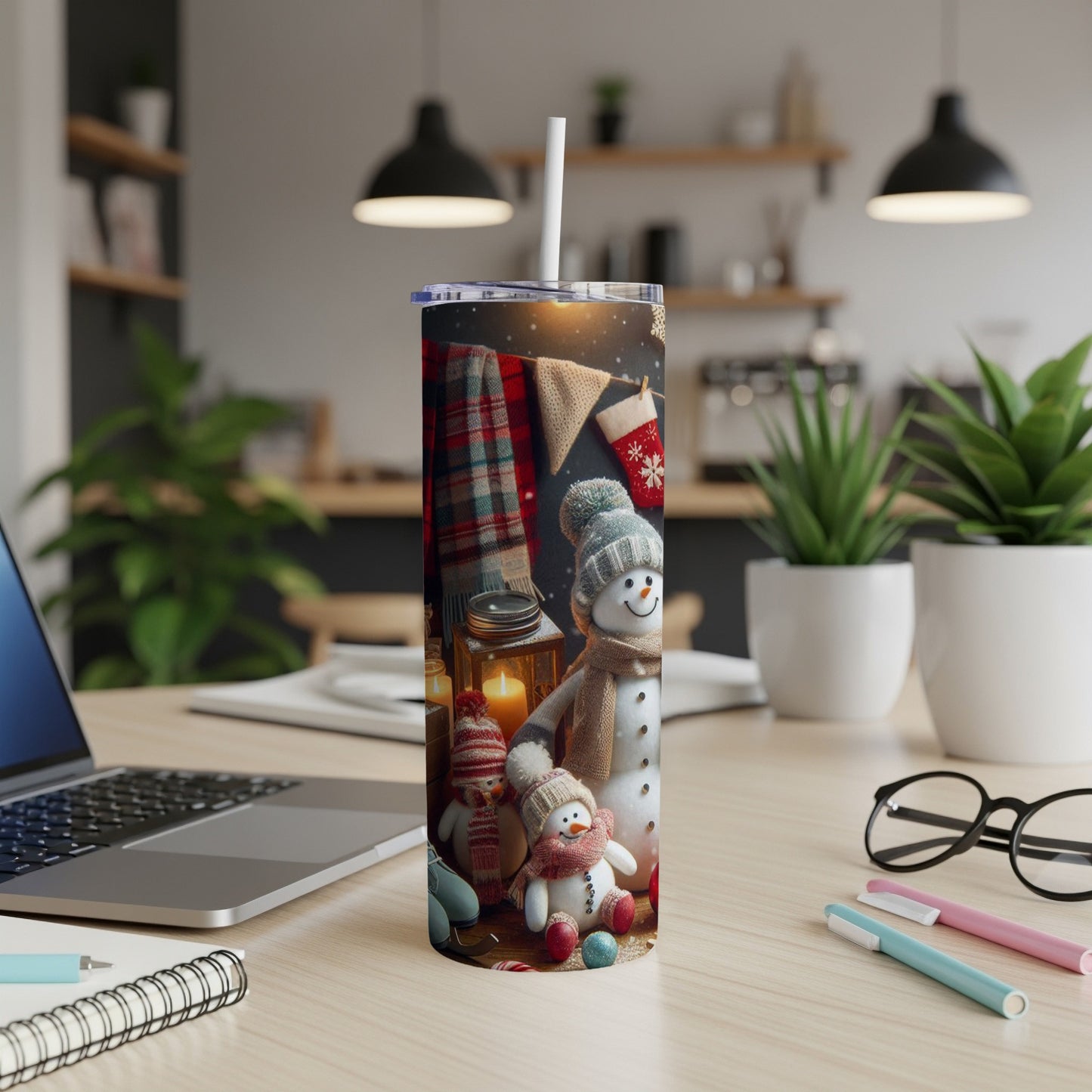Snowman tumbler with festive scarf, hat, and plaid background.