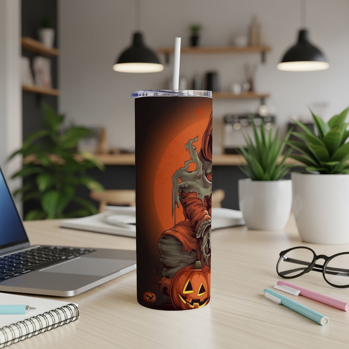 Halloween tumbler with grim reaper and jack-o'-lanterns design.