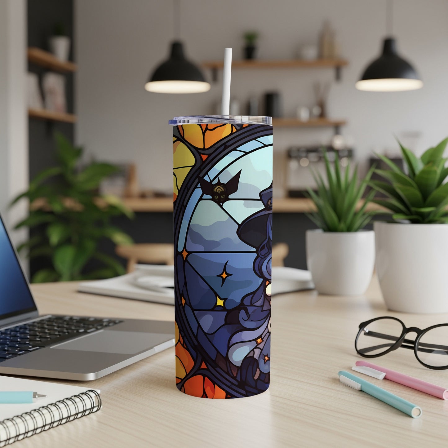 Stained glass tumbler with witch and moon design.