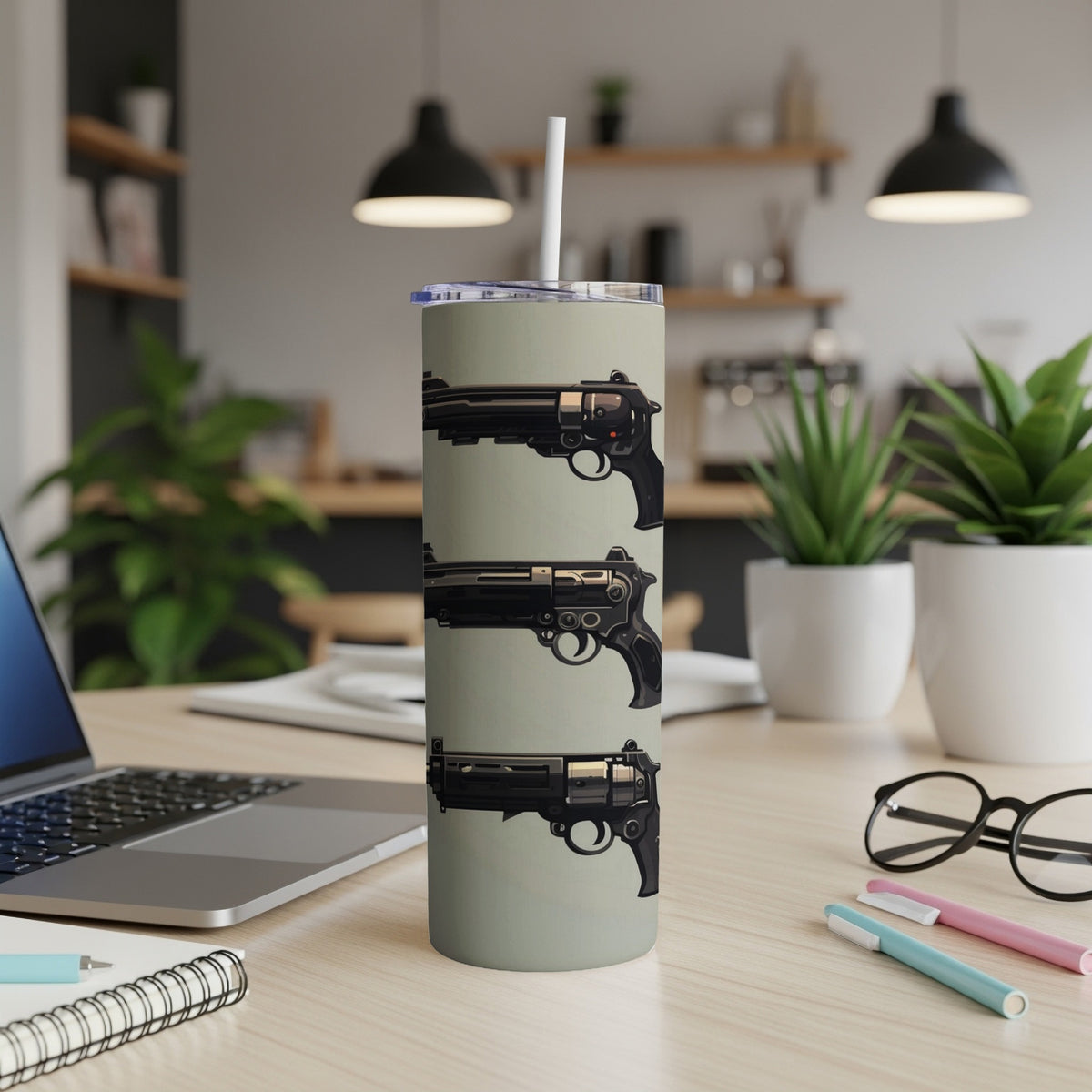 Tumbler with three dark, detailed revolvers stacked vertically against a light gray background.