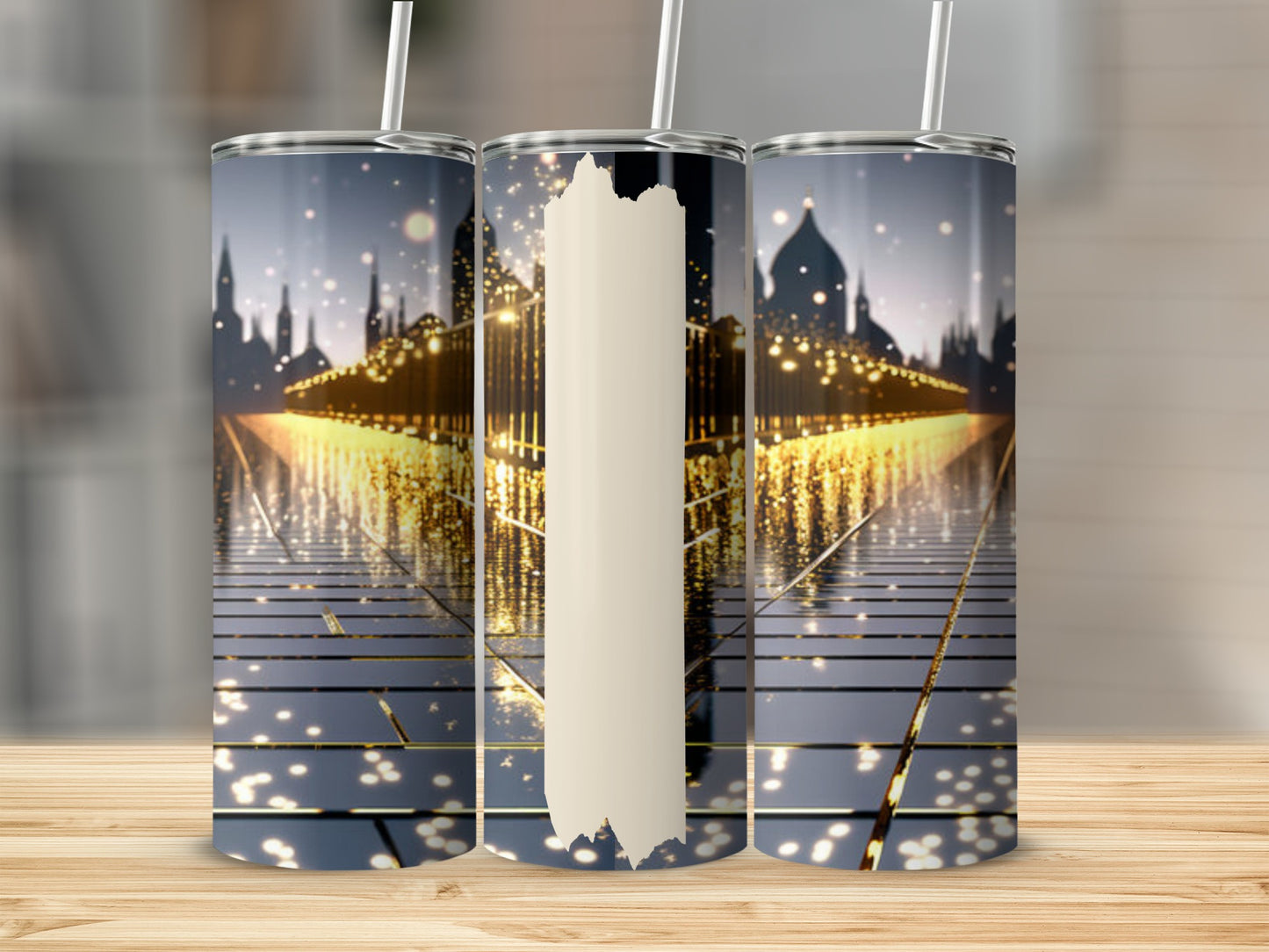 Three tall tumblers featuring a sparkling city skyline at night with golden lights.