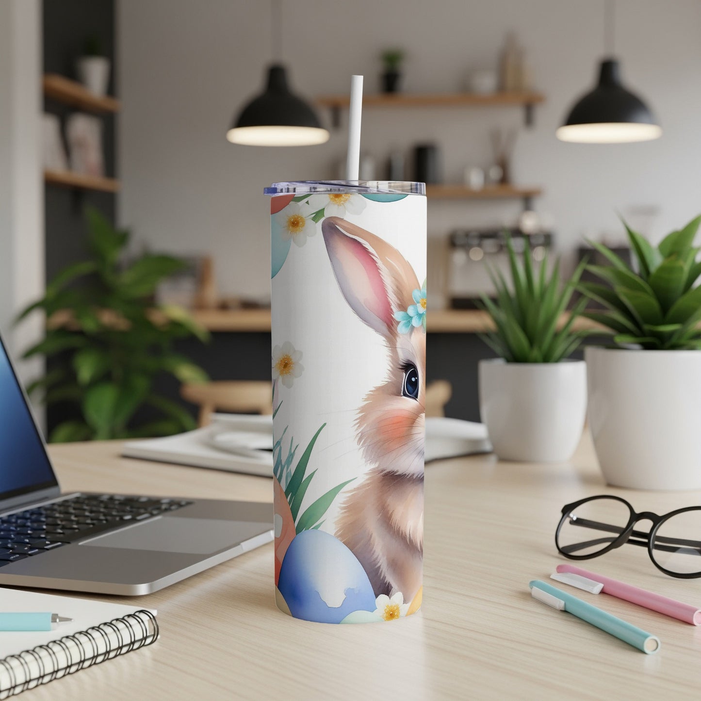 White tumbler with watercolor bunny and Easter eggs.