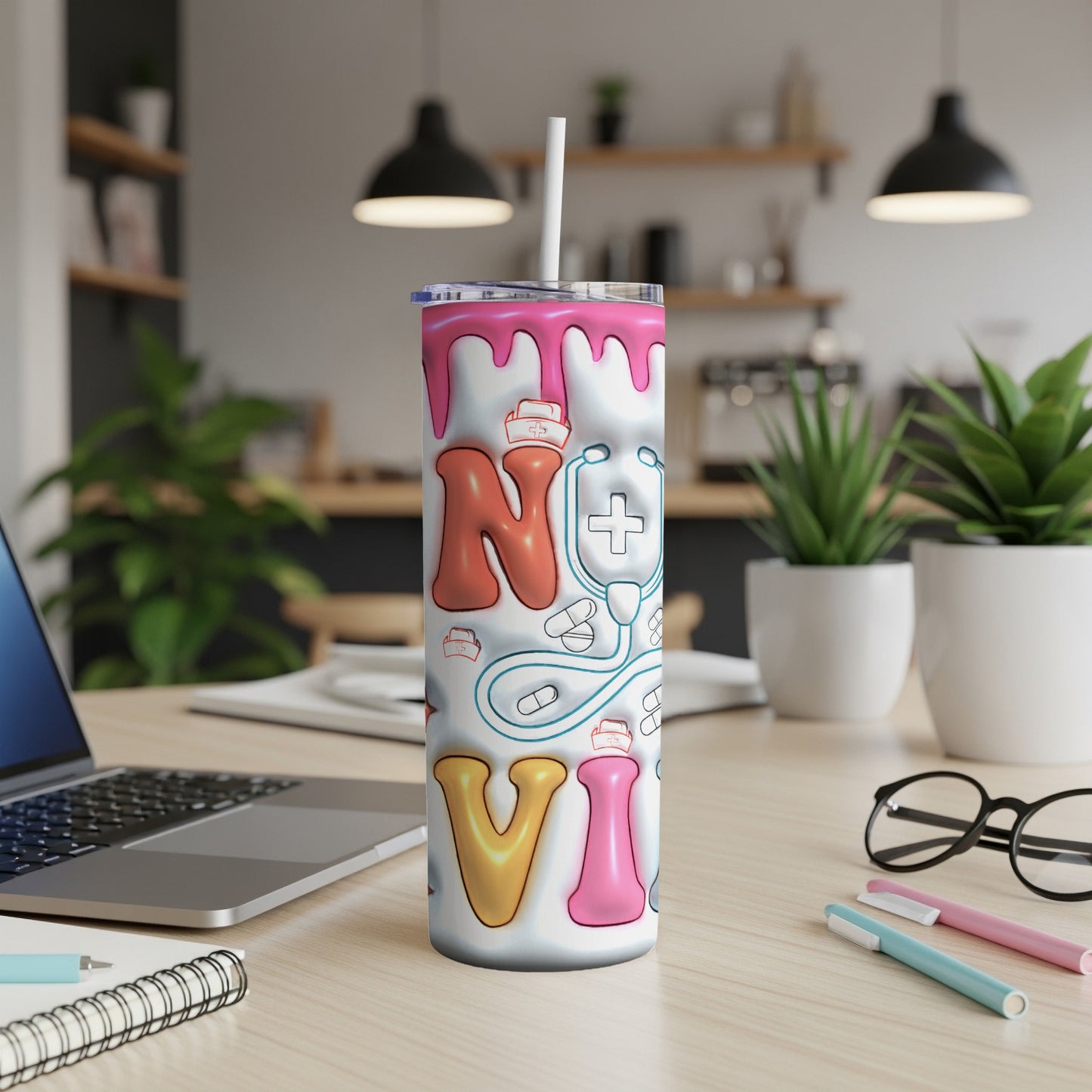 Tumbler with "RN" design featuring medical icons and colorful letters.