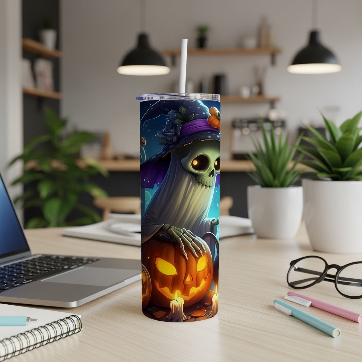 Halloween tumbler with ghost holding pumpkin, lit candles, and witch hat design.