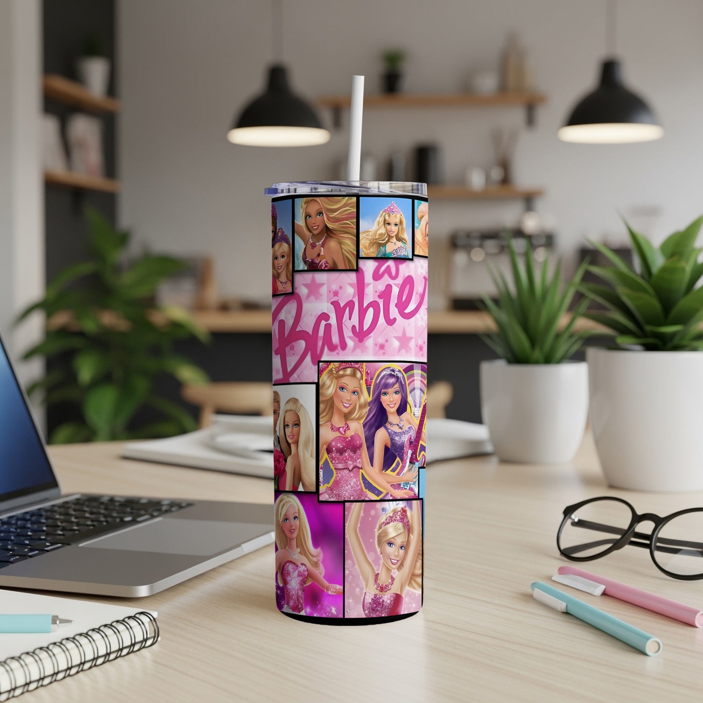 Pink Barbie collage pattern on a white tumbler with straw.