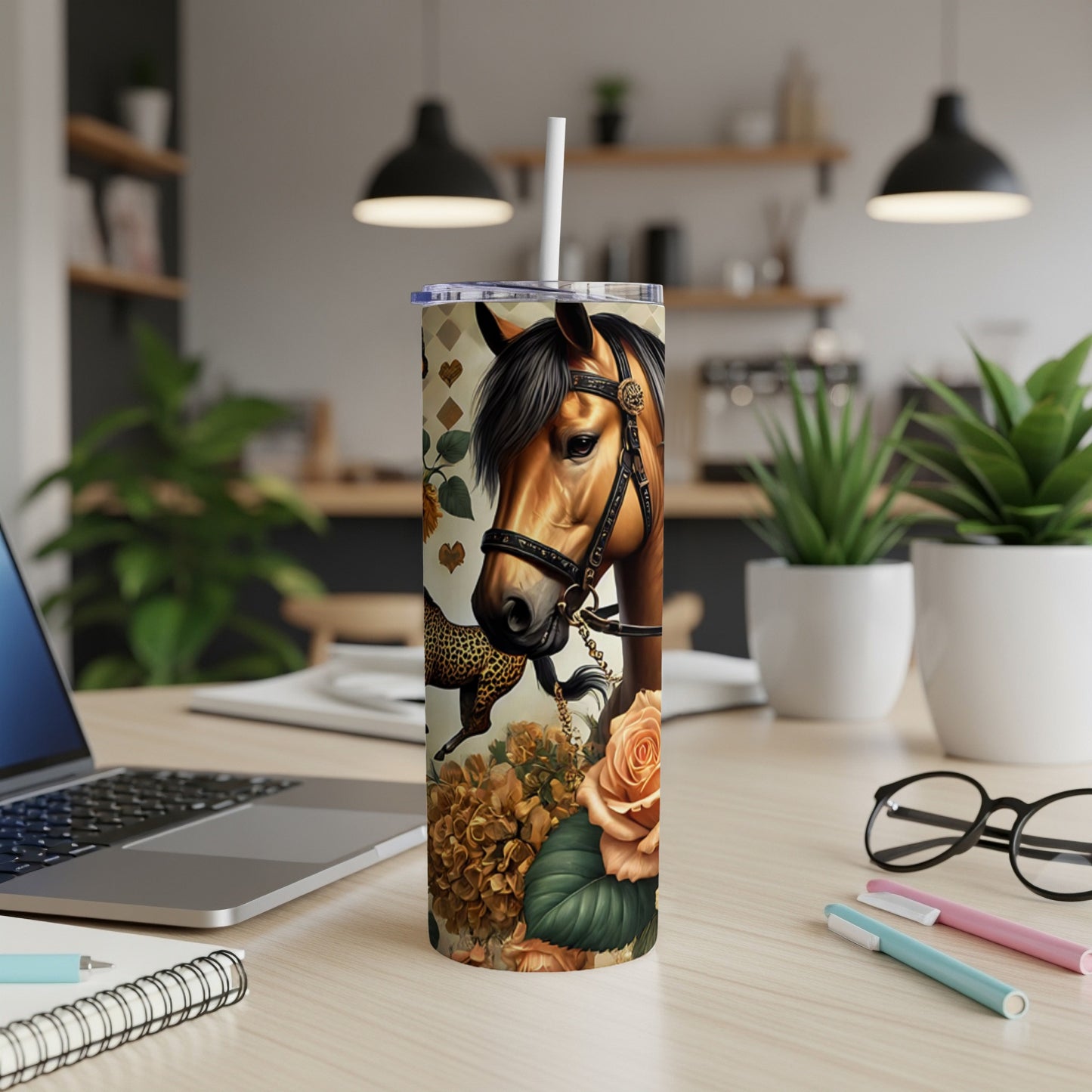 Horse and floral pattern on a white tumbler with a straw.