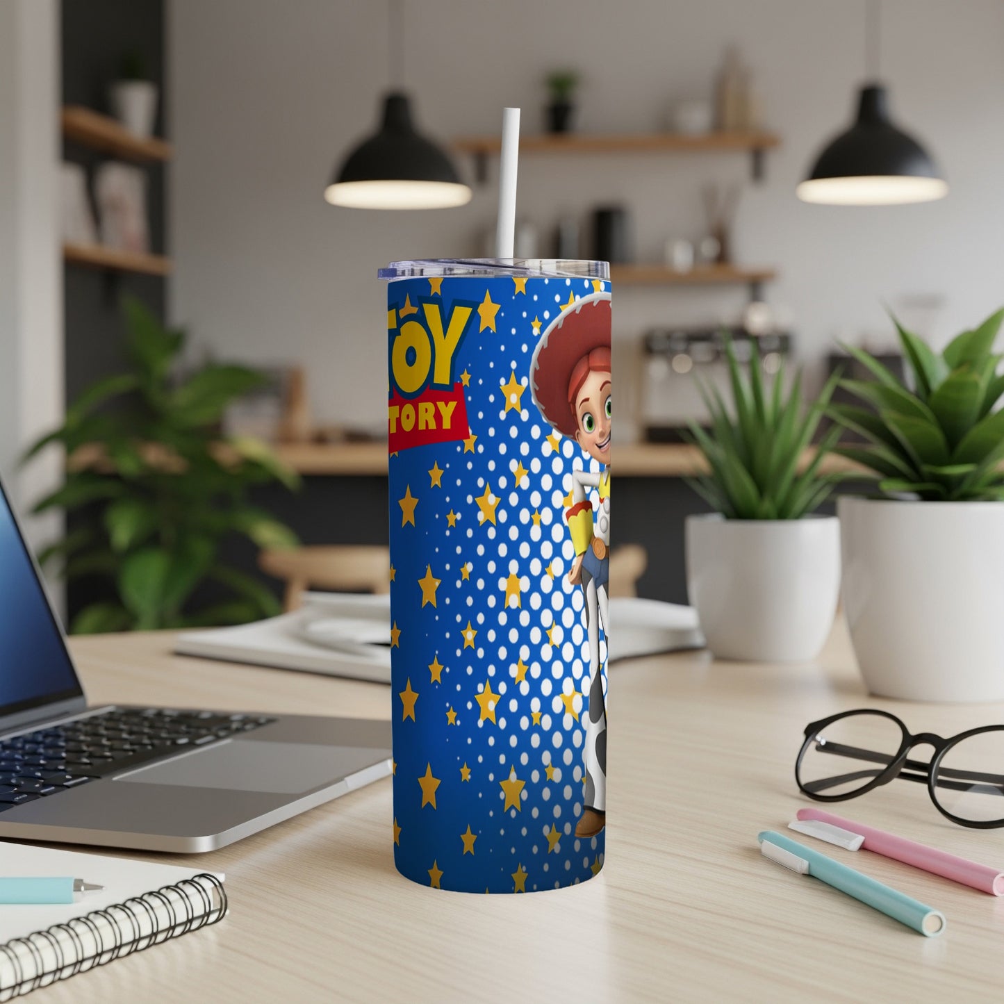 Toy Story Jessie character on a blue tumbler with stars and white straw.