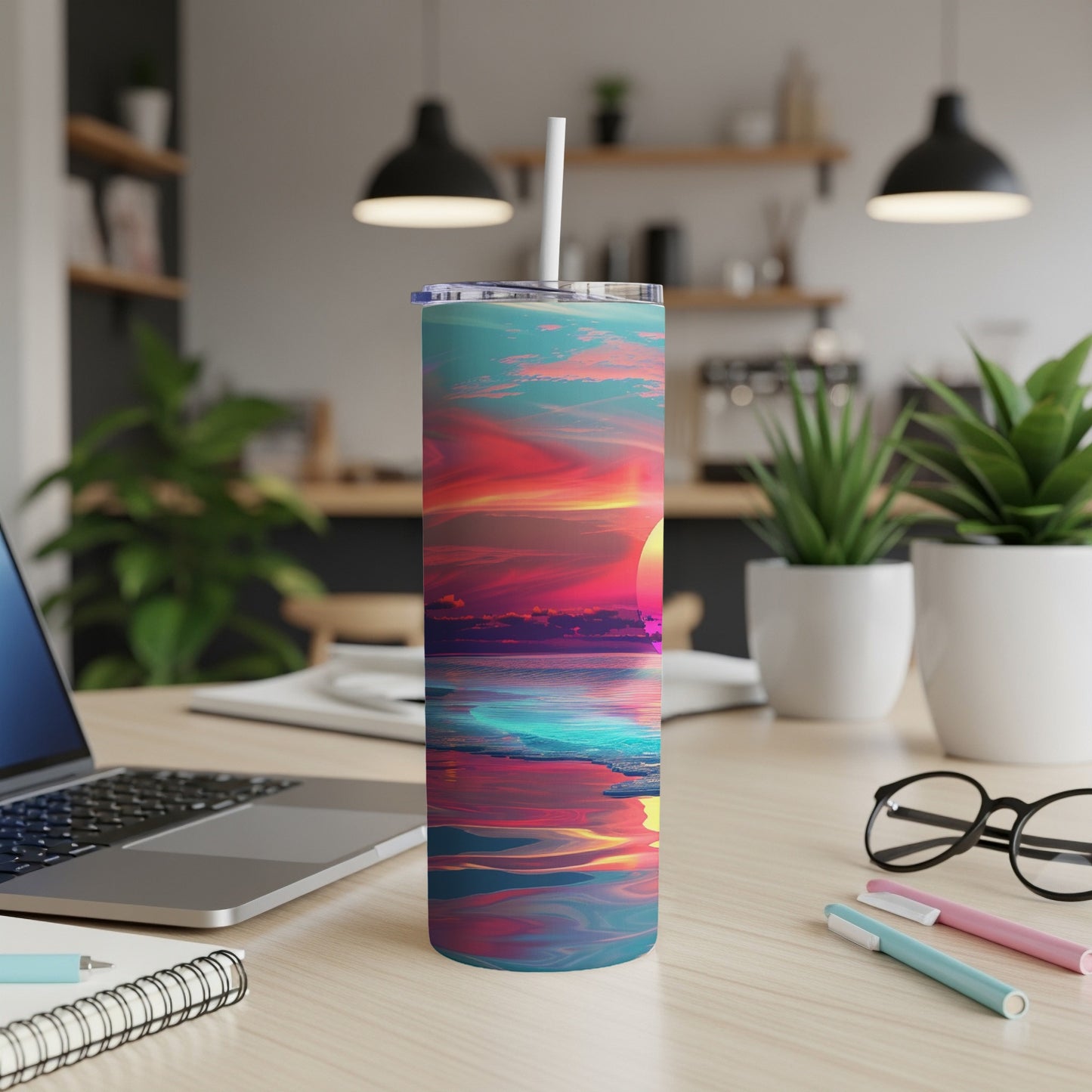 Colorful sunset ocean waves design on a stainless steel tumbler with straw.
