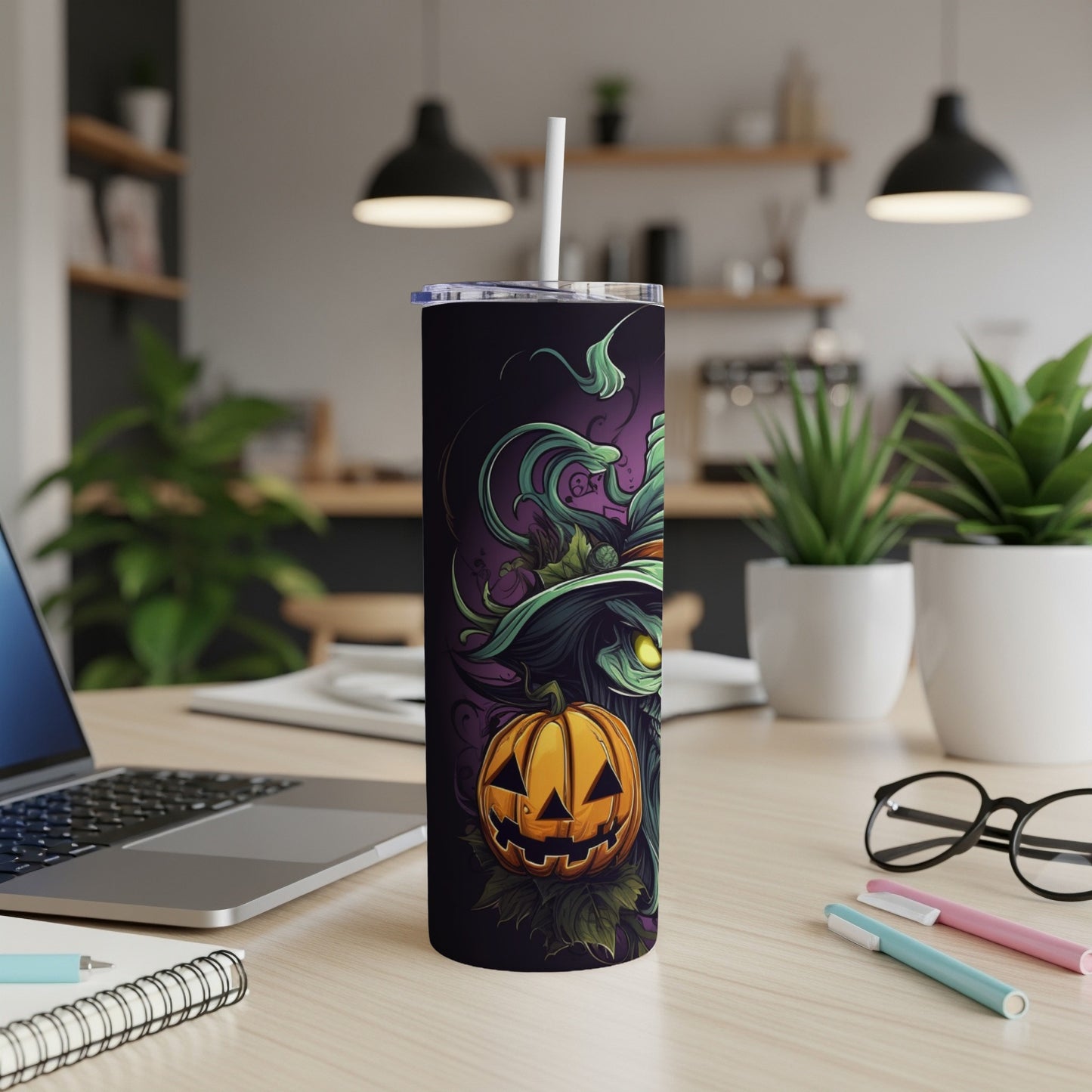 Black tumbler with a Halloween witch and jack-o'-lantern design.