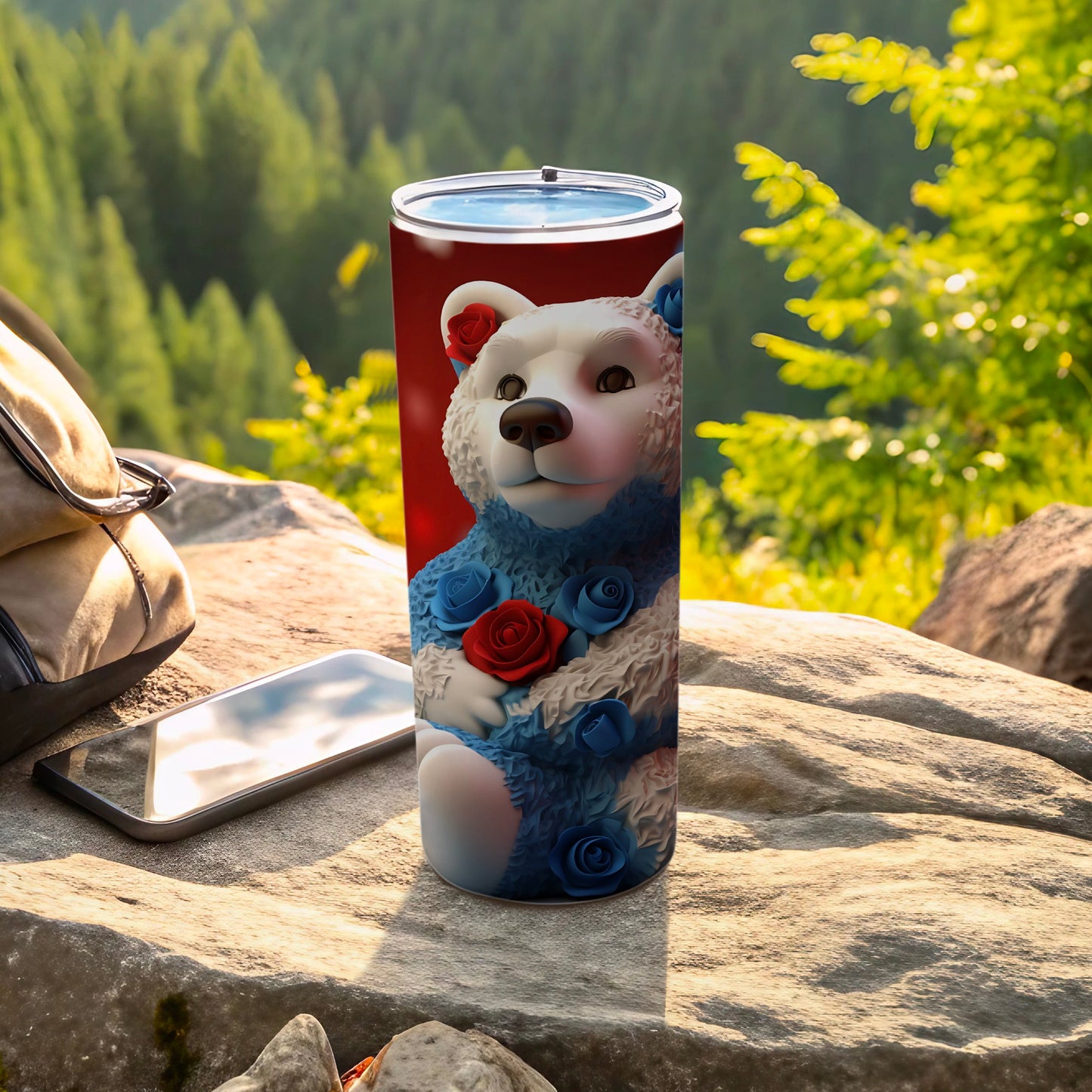 White bear with blue and red roses on a tumbler.