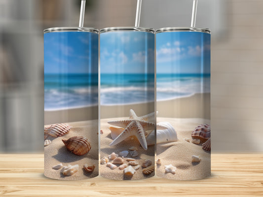 Beach scene with seashells and starfish on sand, featuring three tumblers.
