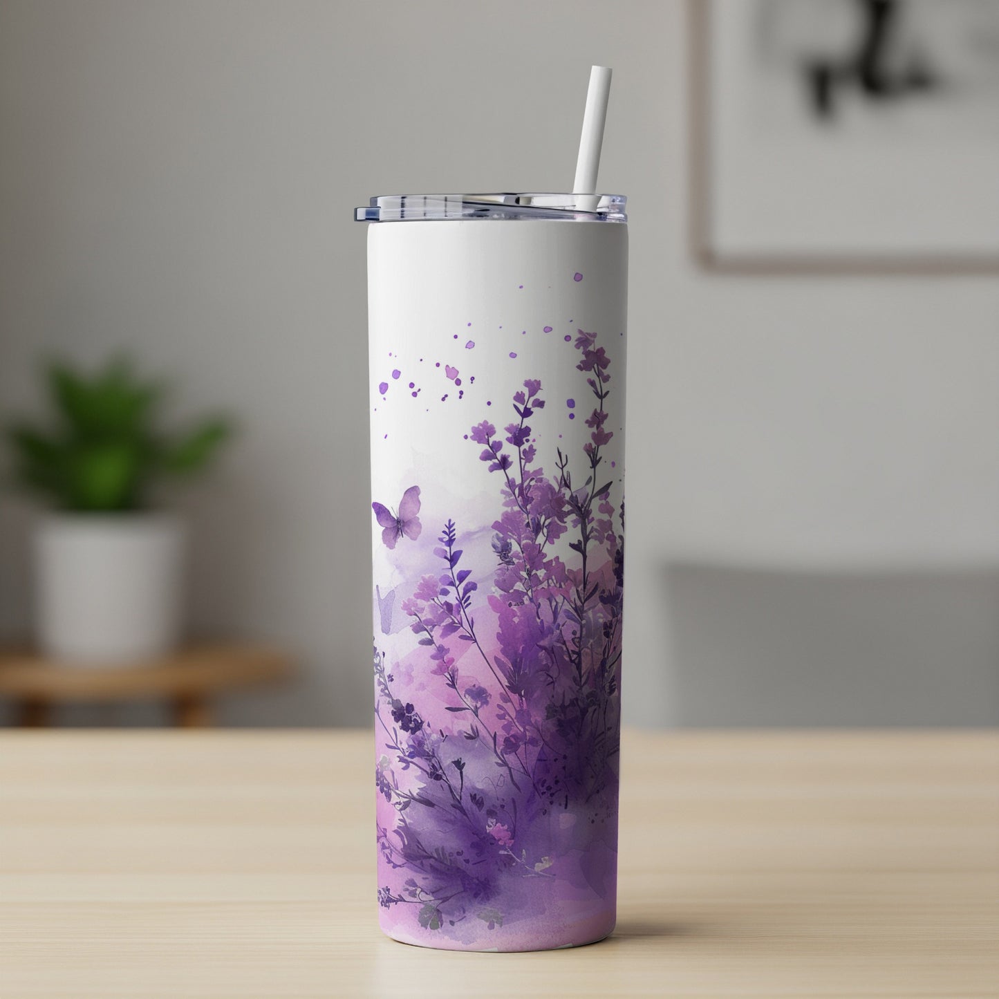 Purple floral and butterfly watercolor tumbler with straw.
