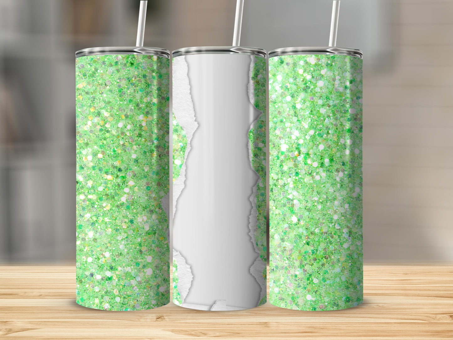 Three glitter tumblers with torn paper effect, two green, one white.