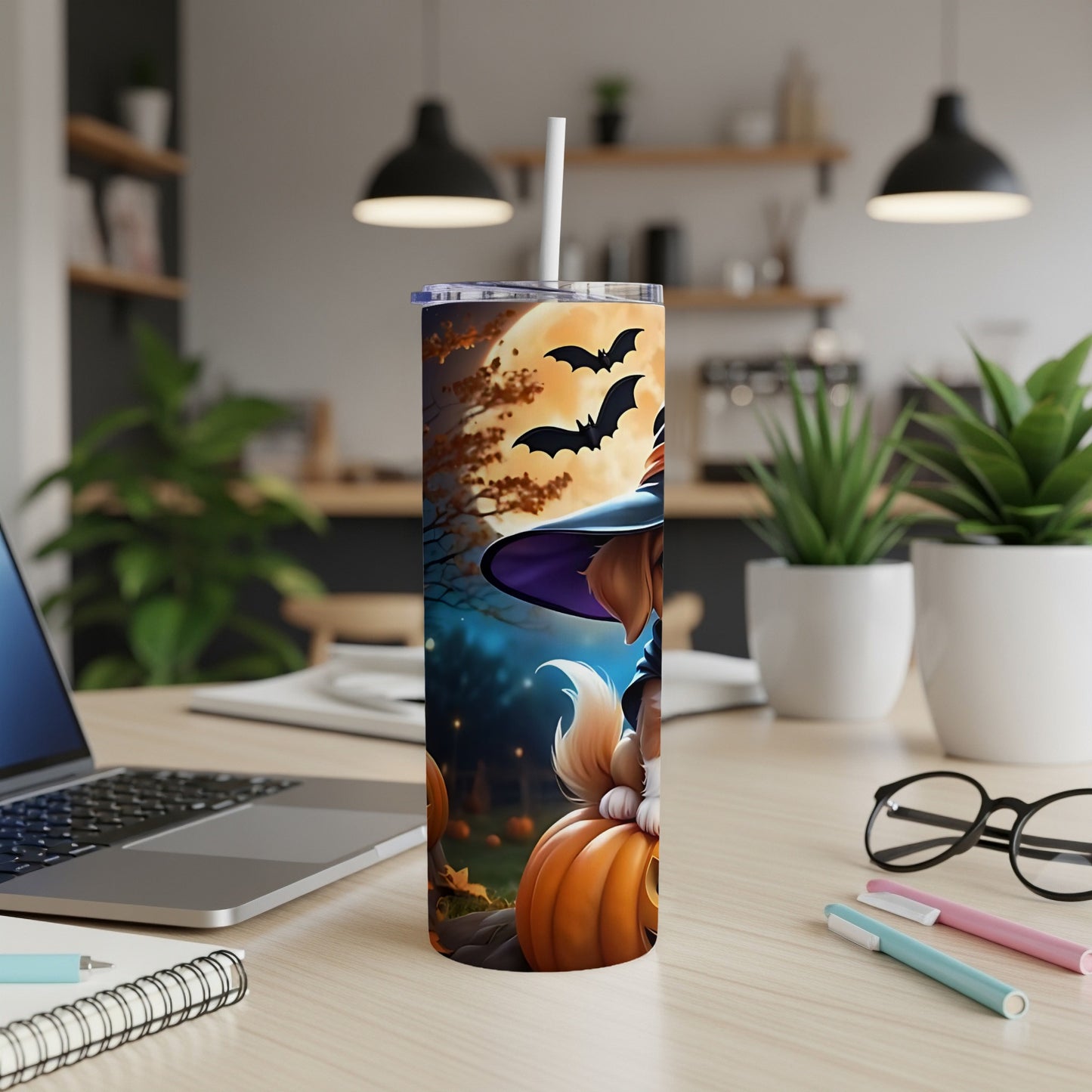 Halloween tumbler with dog, witch hat, pumpkin, and bats on moonlit background.