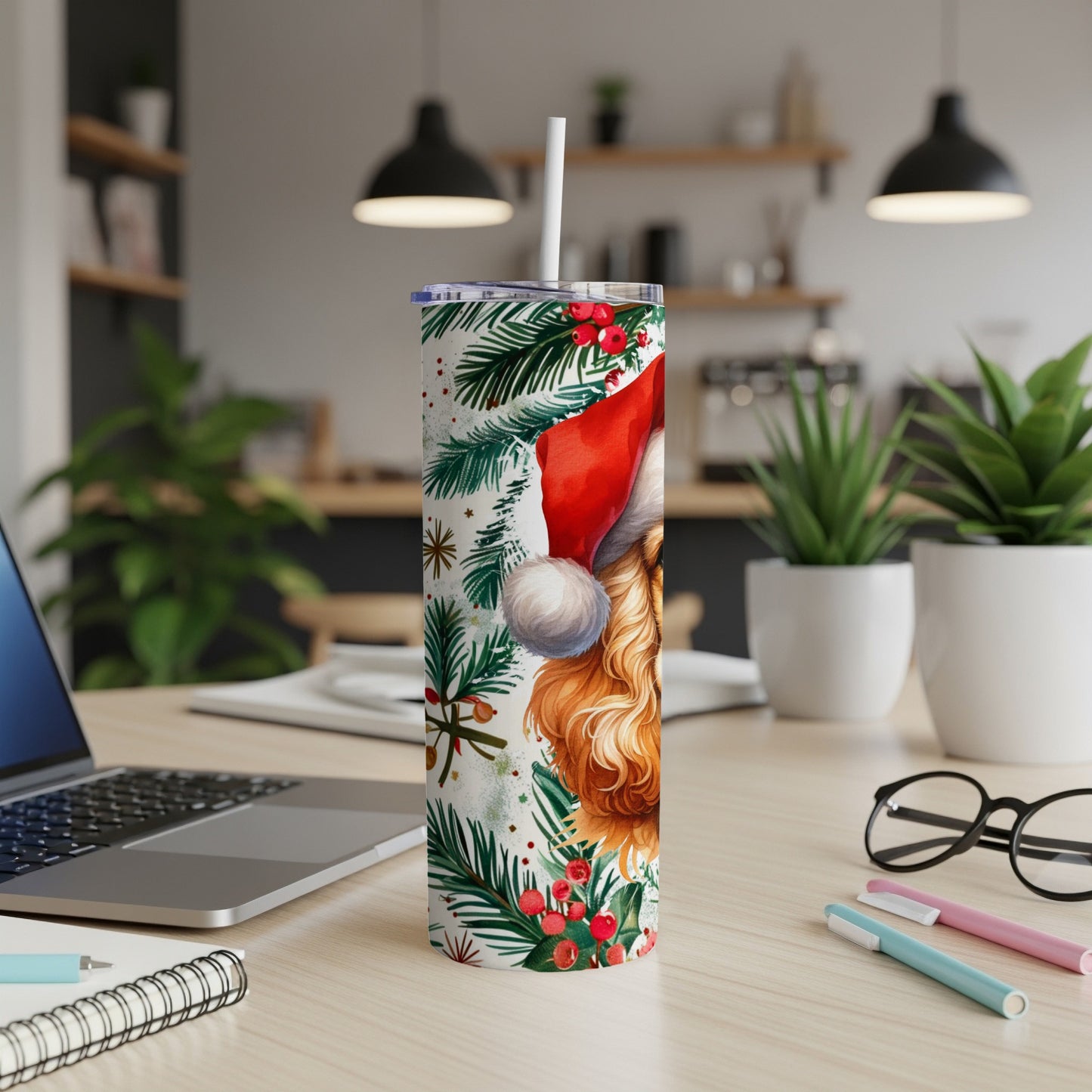 Santa hat wearing dog, holly, and pine sprigs on a white tumbler.