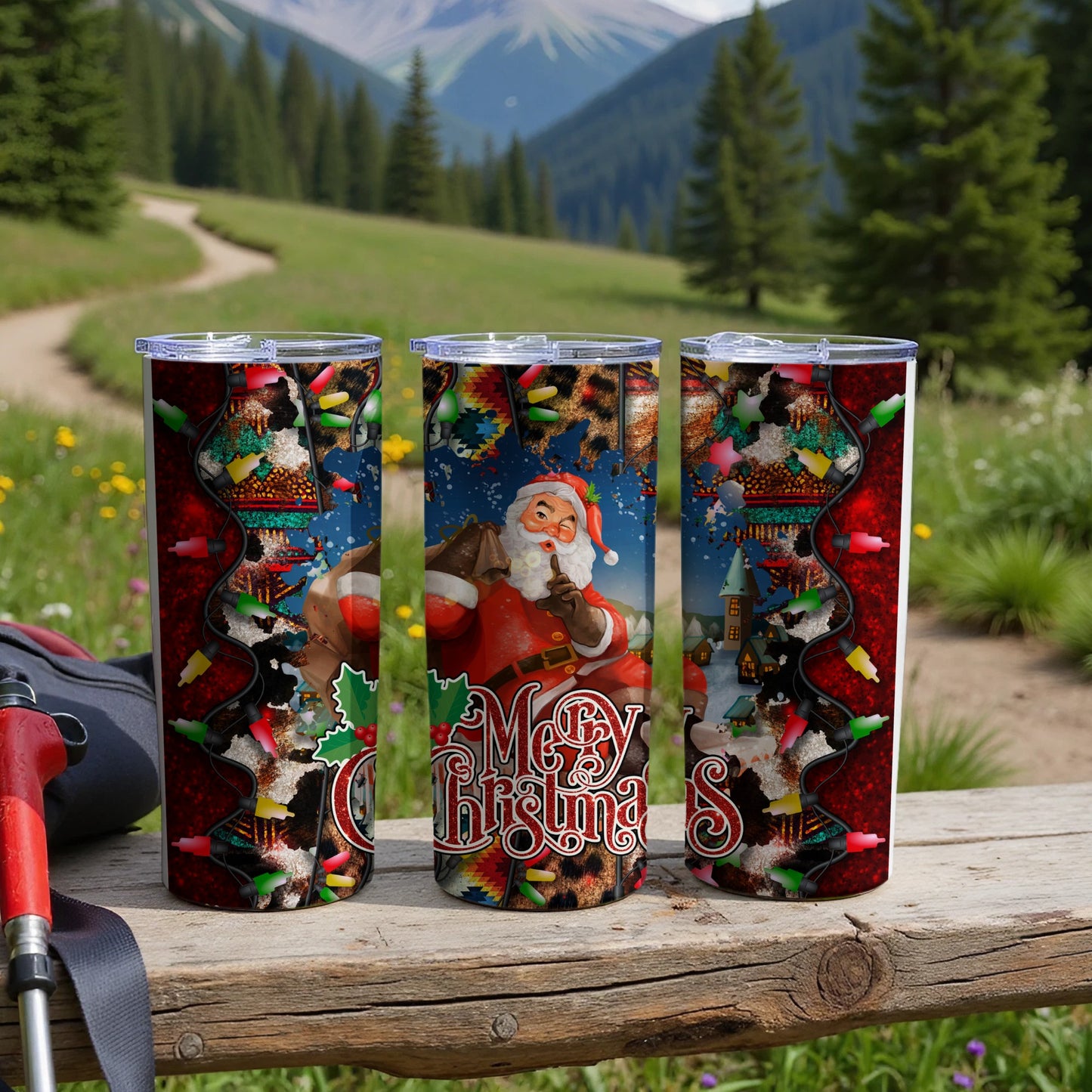 Three tumblers featuring Santa, festive lights, and a snowy village scene.
