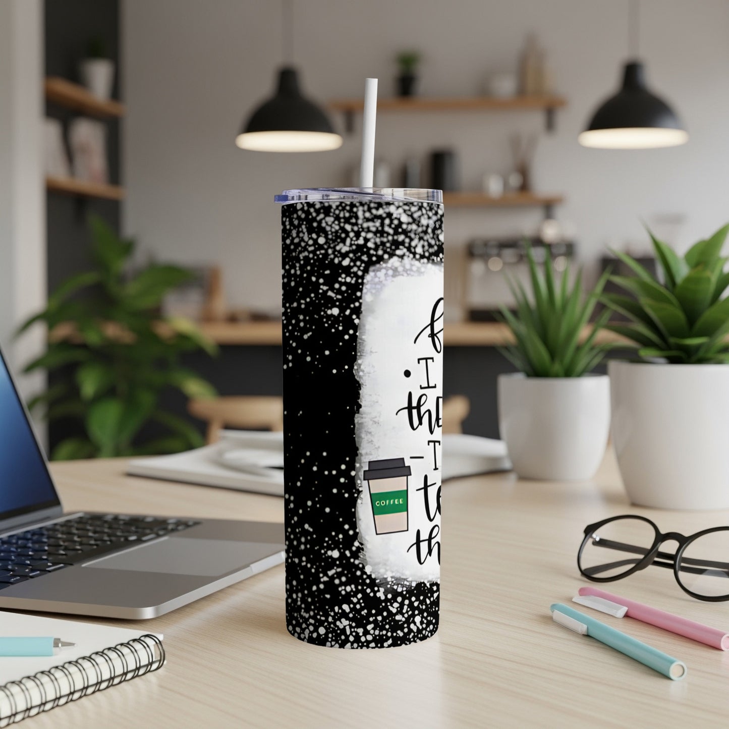 Black speckled tumbler with white text and a green coffee cup graphic.
