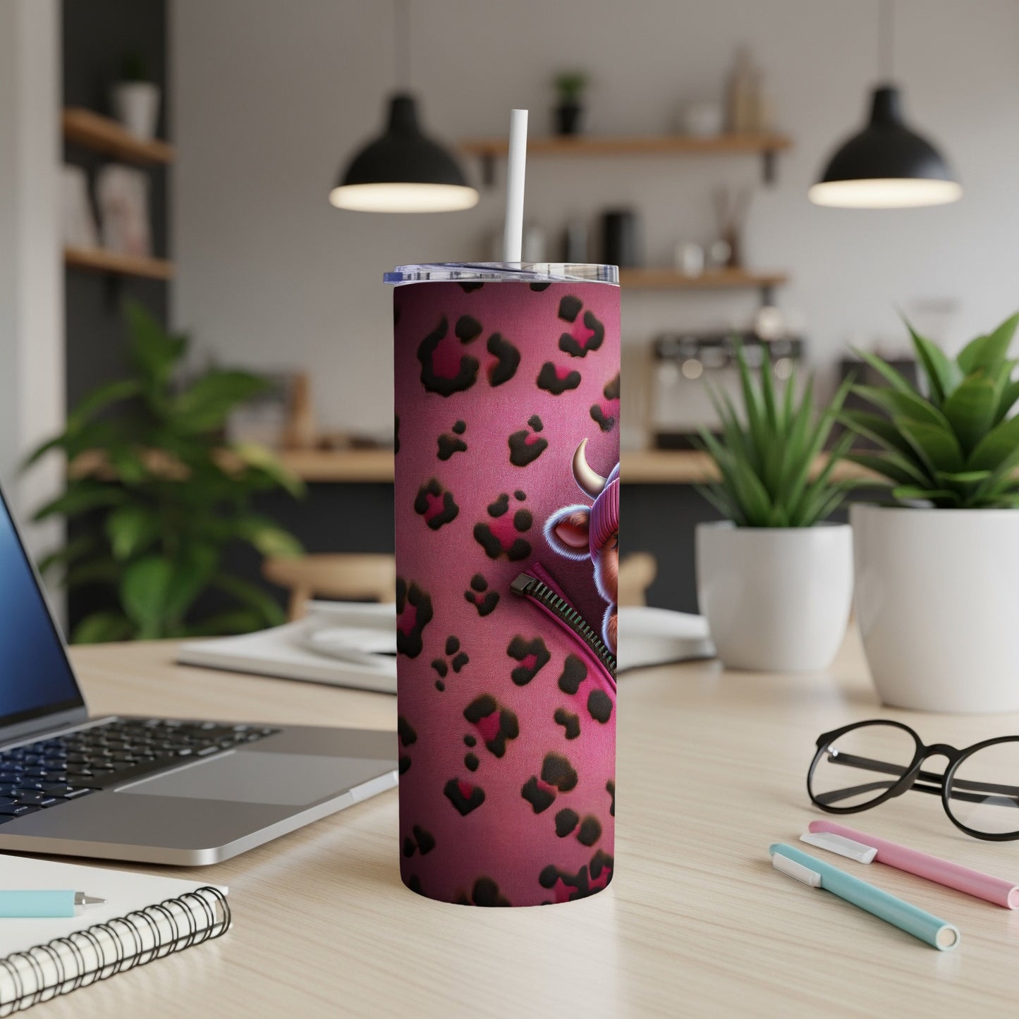 Pink leopard print tumbler with a zipper and heart graphic.