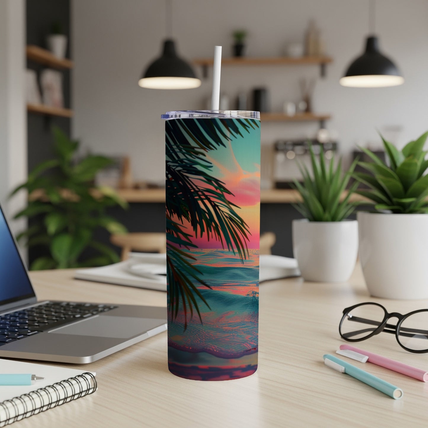 Tall tumbler with sunset ocean waves and palm fronds design.