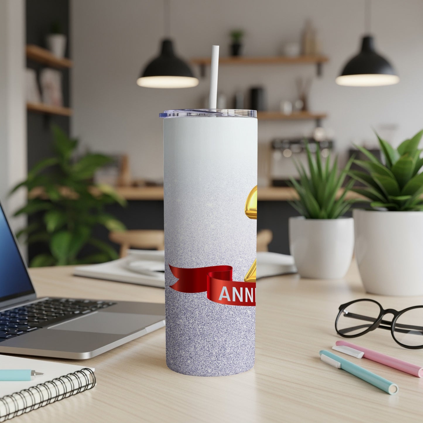 Glittery tumbler with "Anniversary" text and gold number.