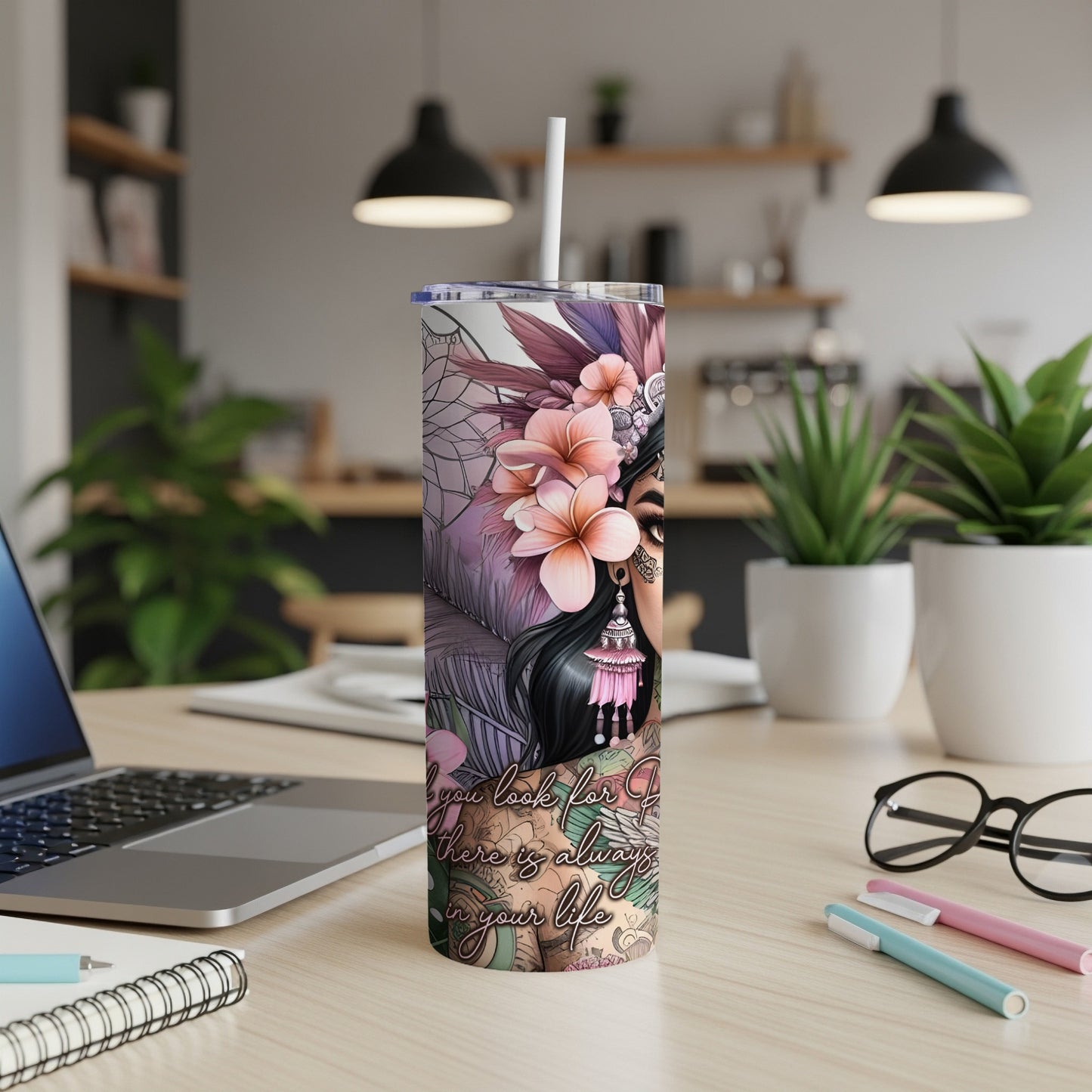 Tumbler with floral design and woman's face, "you look for joy" text.