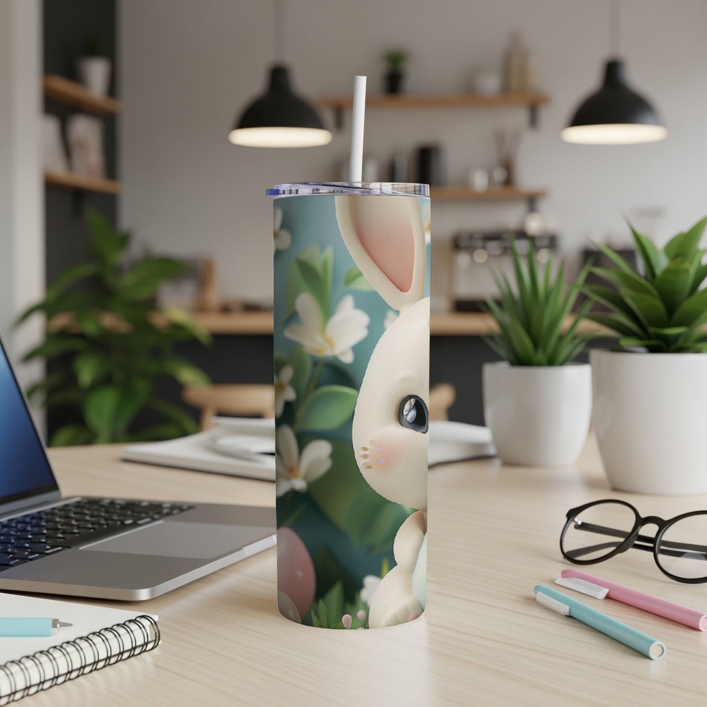 White Easter bunny tumbler with pastel flowers and Easter eggs.