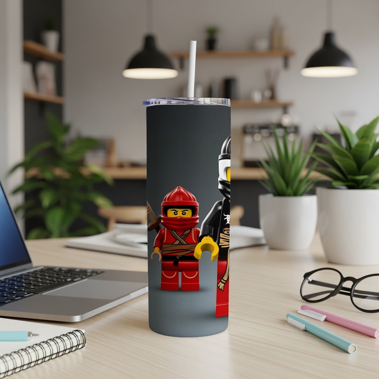 Two Lego Ninjago characters, Kai and Cole, on a tumbler.