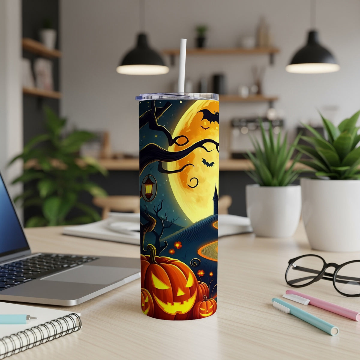 Halloween tumbler with pumpkins, bats, and a full moon design.
