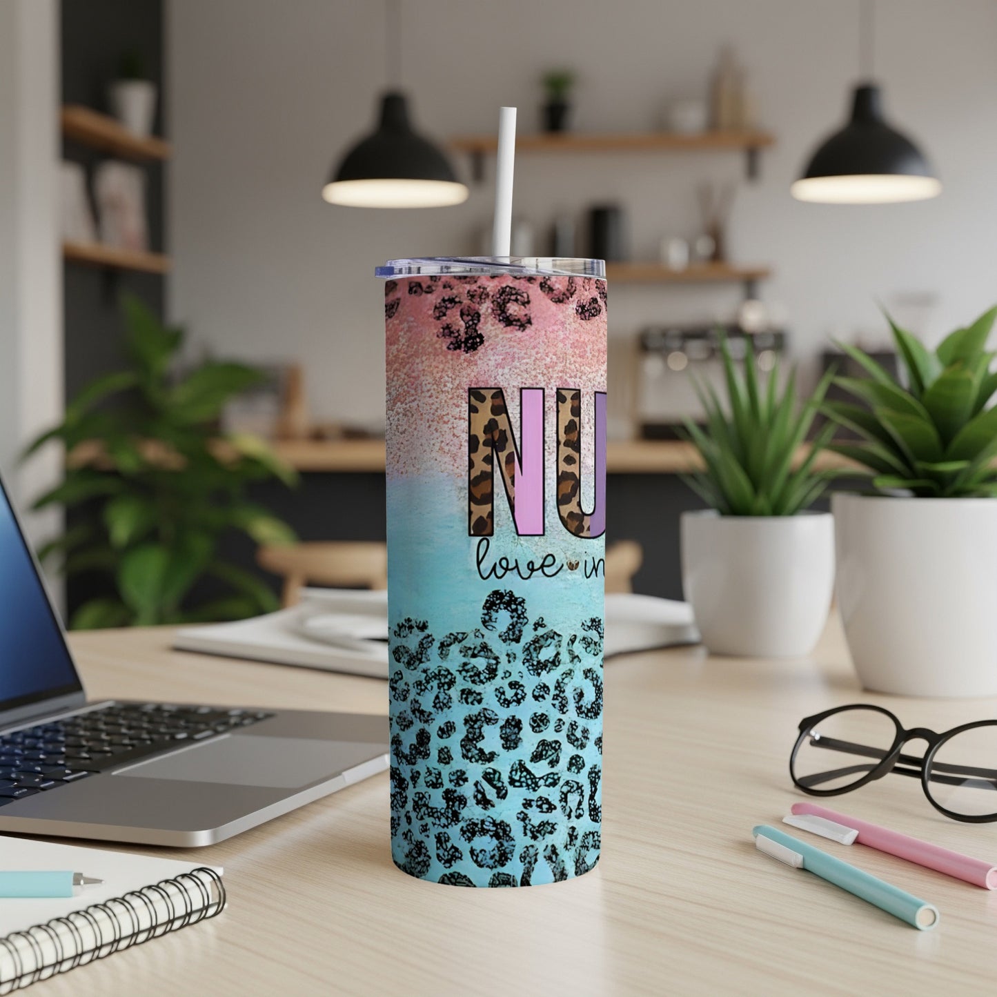 Tall tumbler with "love you" text and leopard print design.