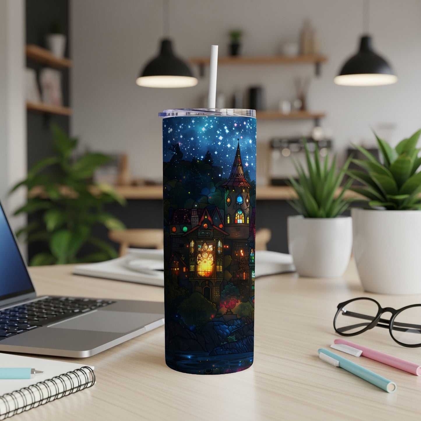 Tall tumbler featuring a colorful haunted house scene against a starry night sky.