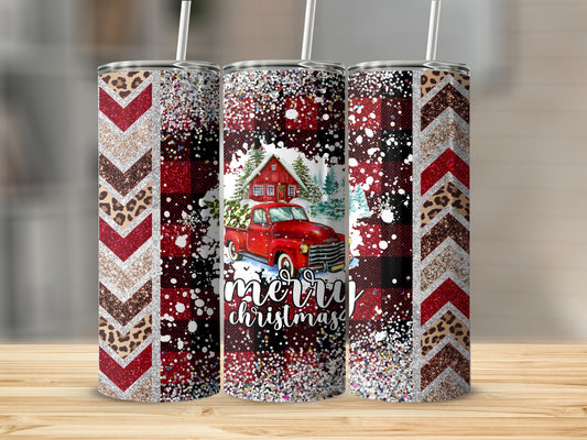 Three Christmas tumblers with plaid, leopard print, and glitter.