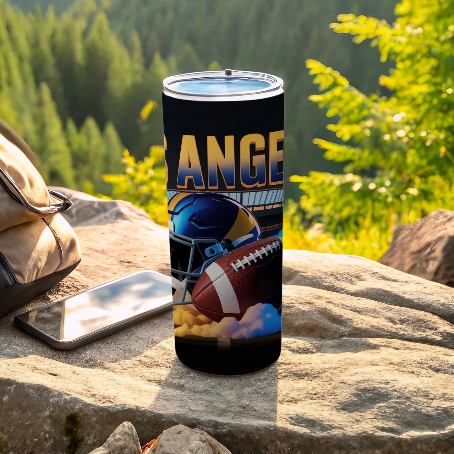 Tumbler with football helmet, football, and stadium text.