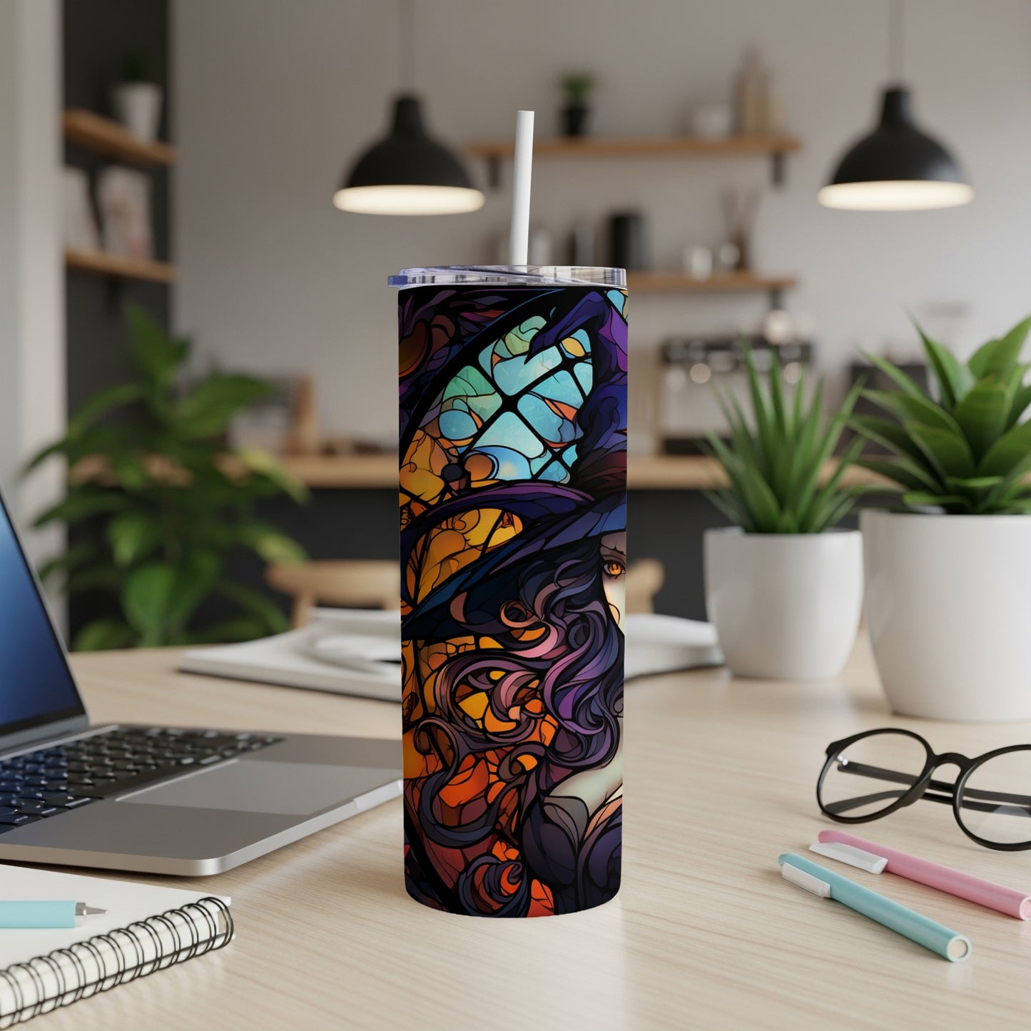 Tall tumbler with witch and stained glass design.