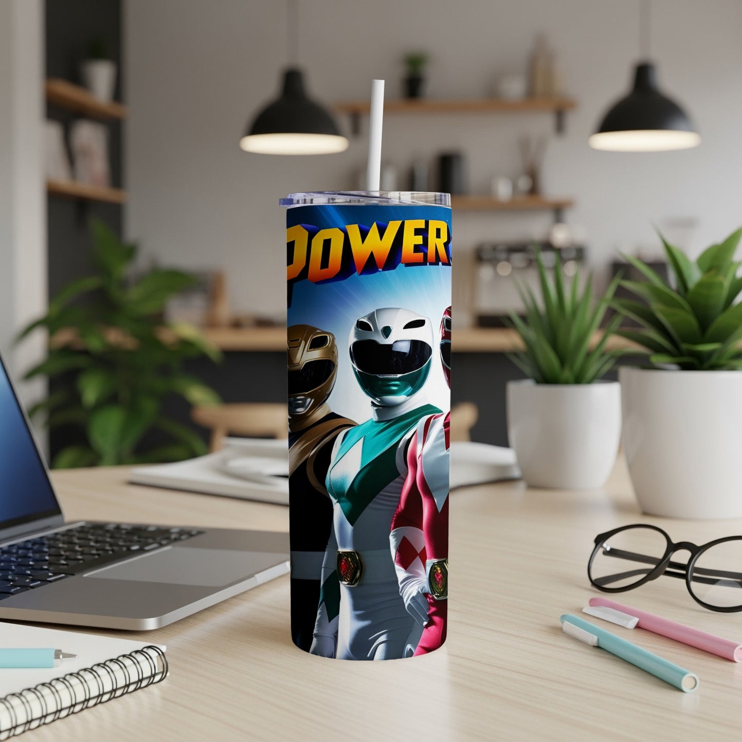 Power Rangers characters on a white tumbler with a straw.