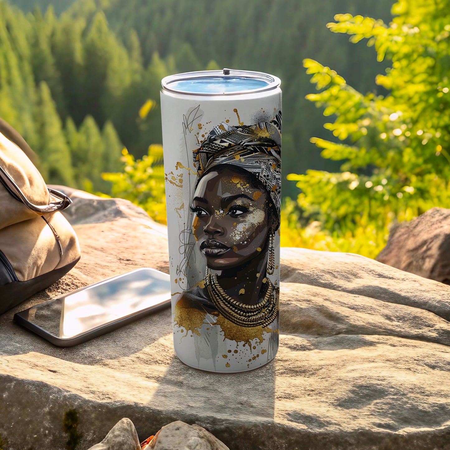 White tumbler with gold accents featuring a Black woman's profile.