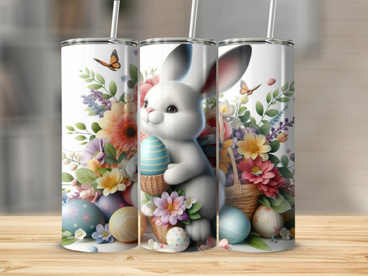 Easter bunny with painted eggs and flowers on a tumbler.