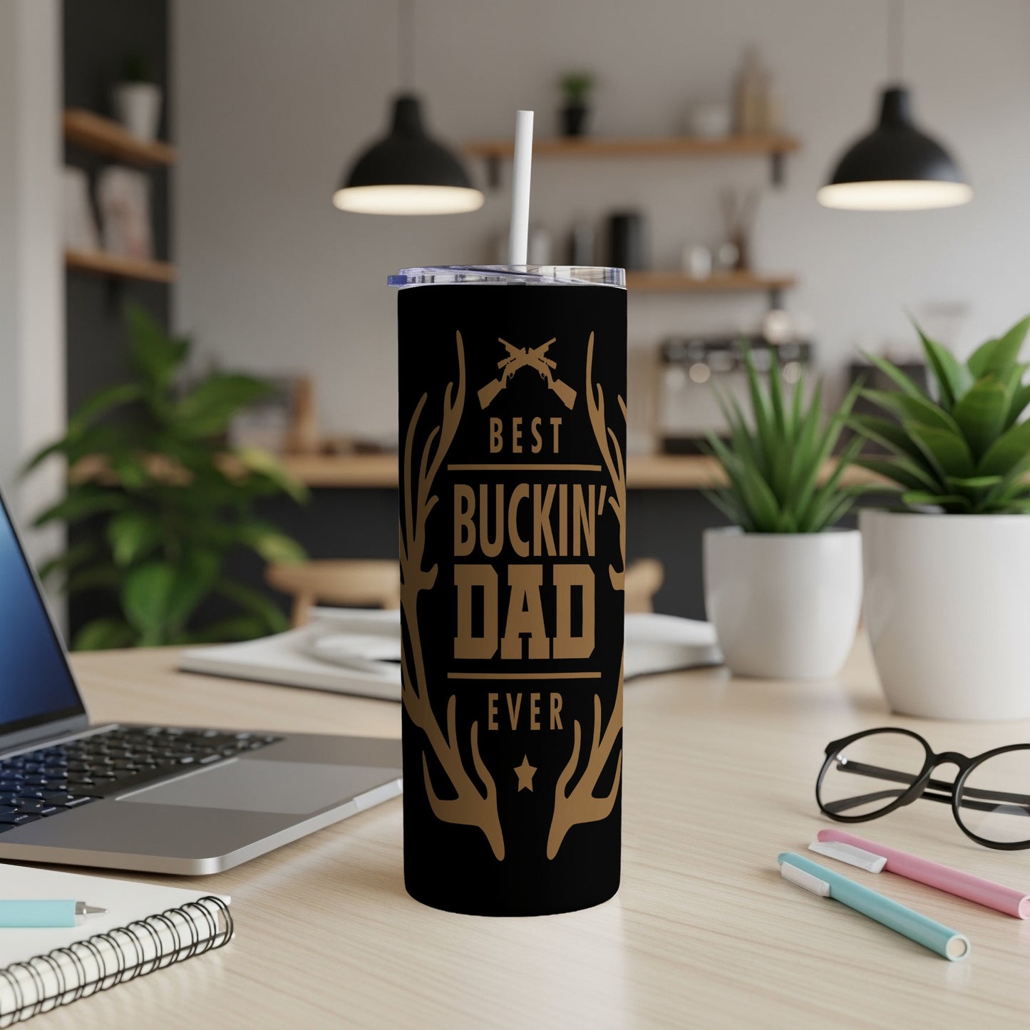 Black tumbler with "Best Buckin' Dad Ever" text and crossed rifles graphic.