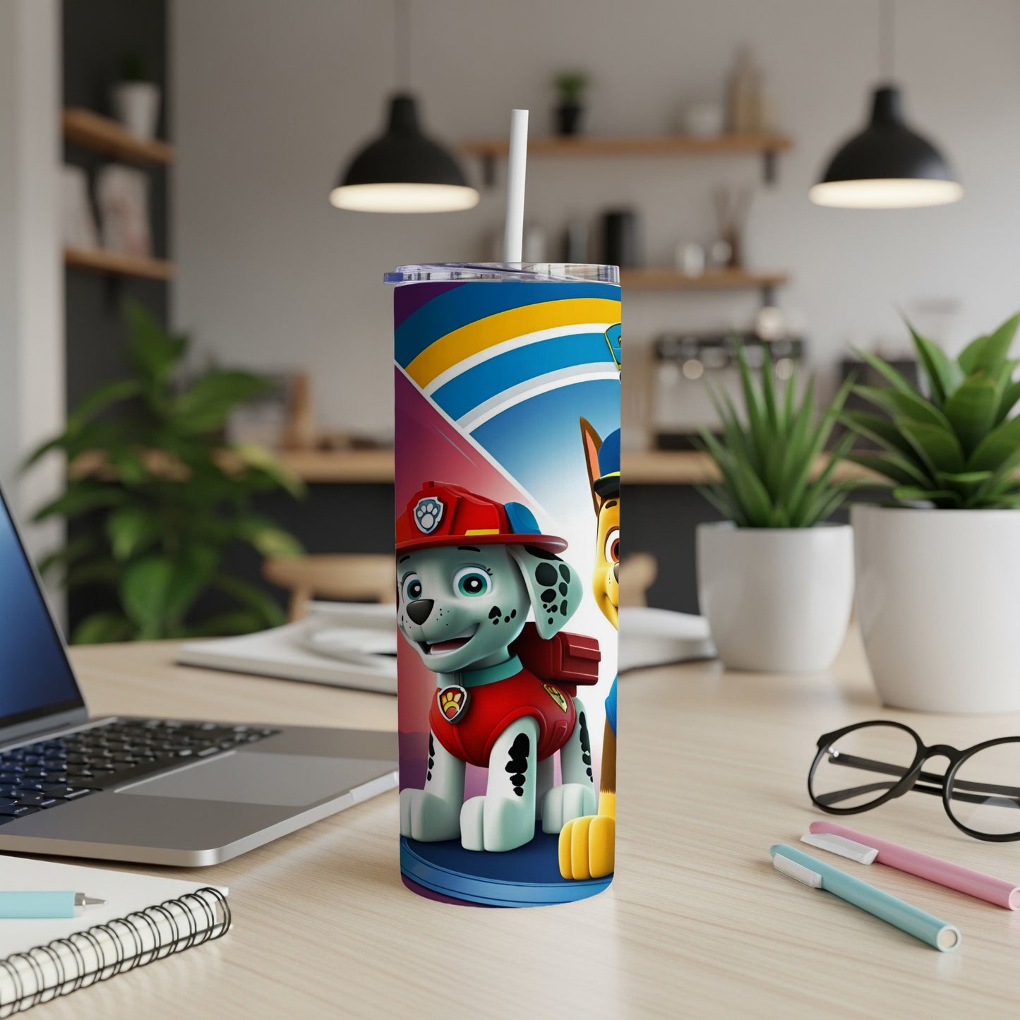 Paw Patrol Marshall and Chase on a colorful tumbler with a white straw.