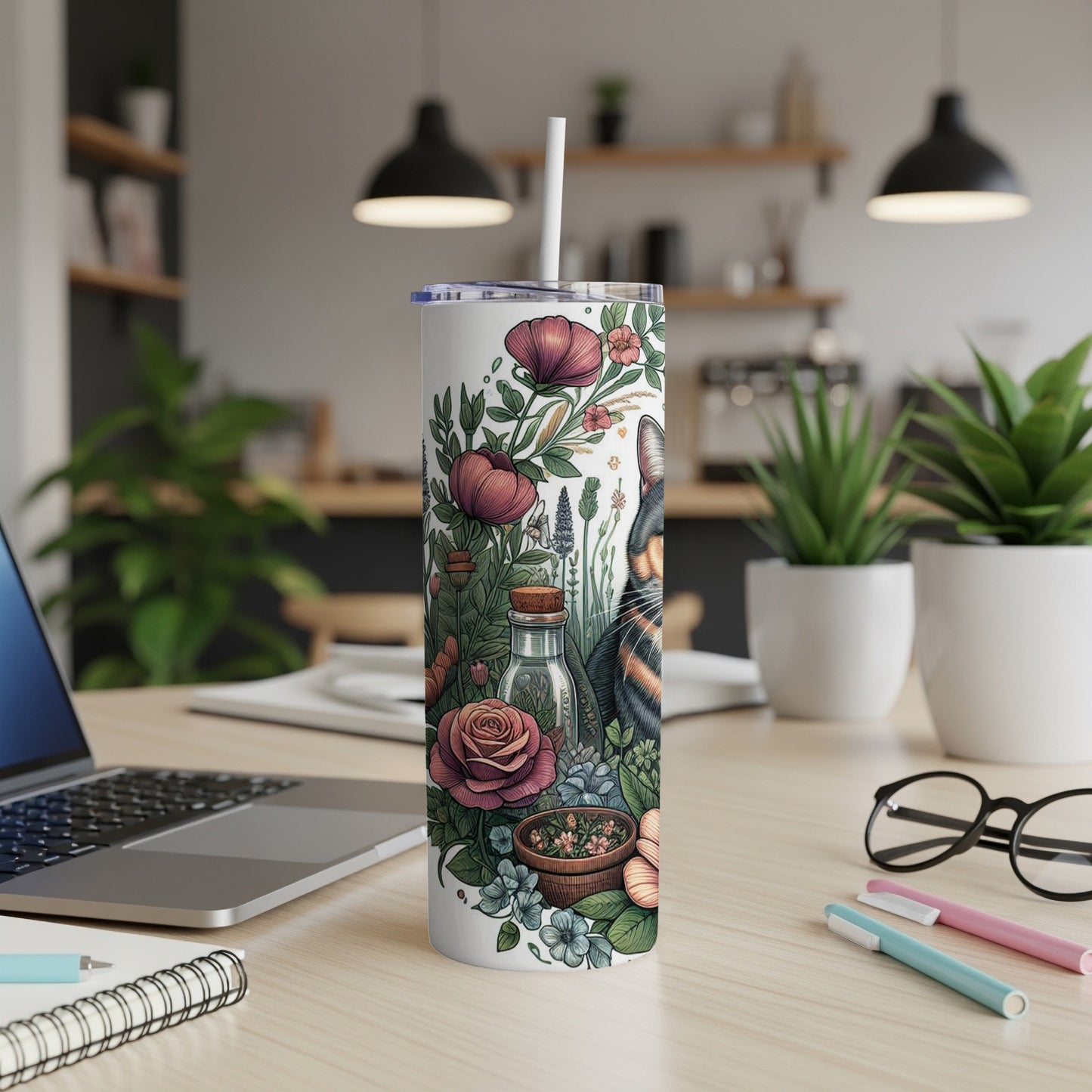 Tall tumbler with cat, floral, and potion bottle design.