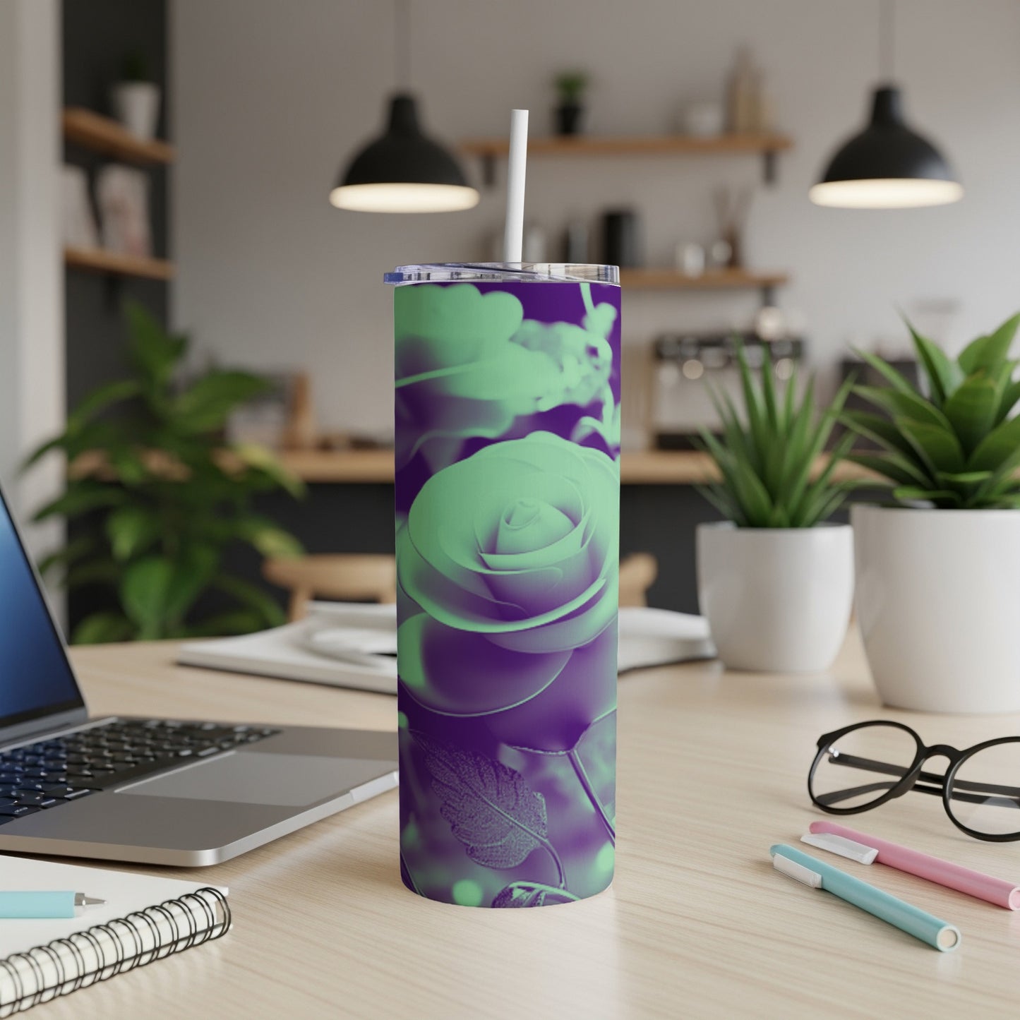 Purple and green rose design on a stainless steel tumbler with straw.
