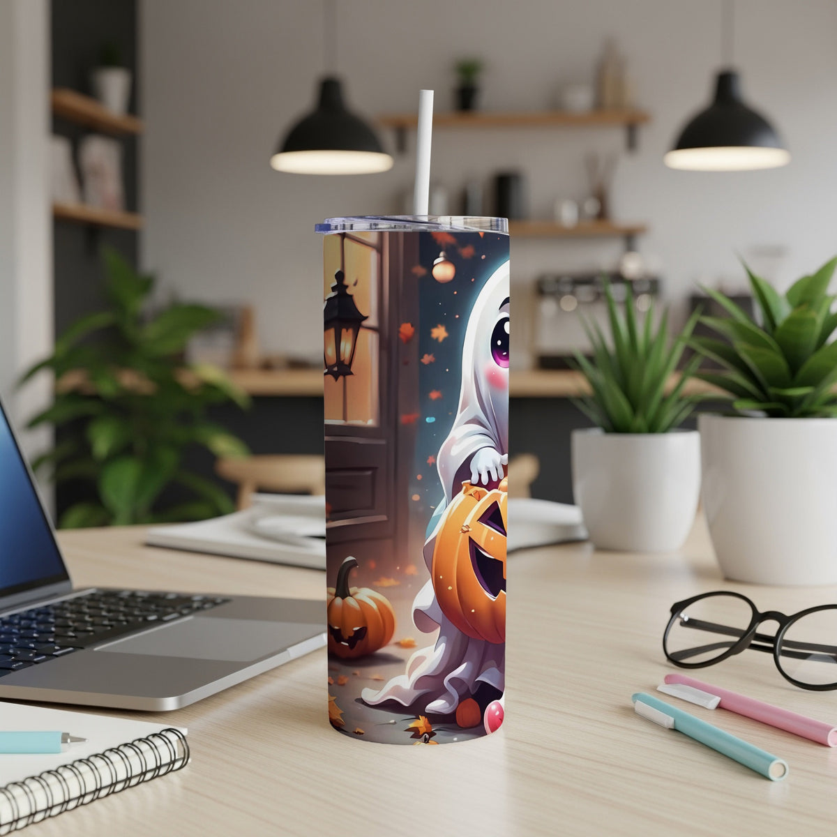 Tumbler with a cute ghost holding a jack-o'-lantern on a Halloween-themed background.
