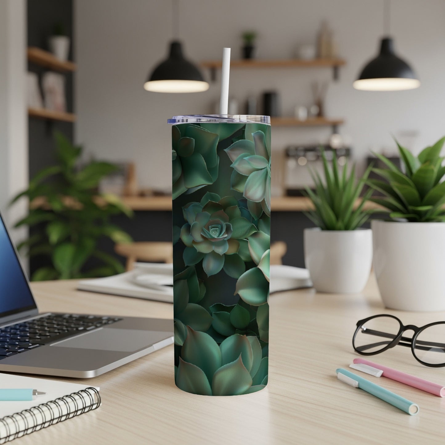 Tumbler featuring a dark green succulent plant pattern.