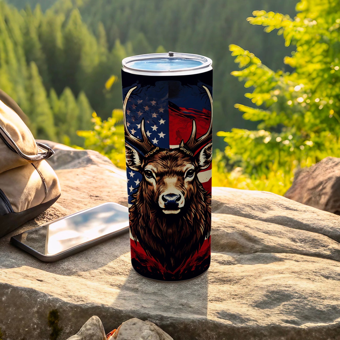 Tumbler with deer, US flag, and wilderness background.