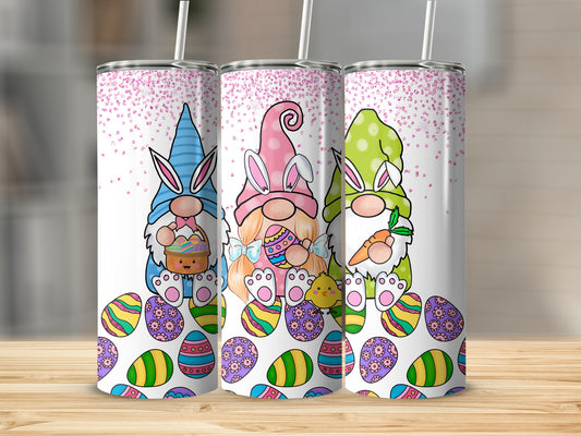 Three Easter gnomes with painted eggs, one holding a basket.