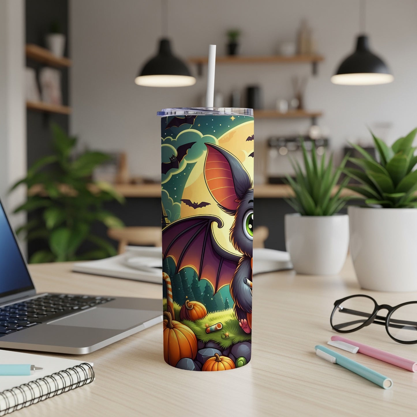 Tumbler with cartoon bat, pumpkins, and bats against a full moon night sky.