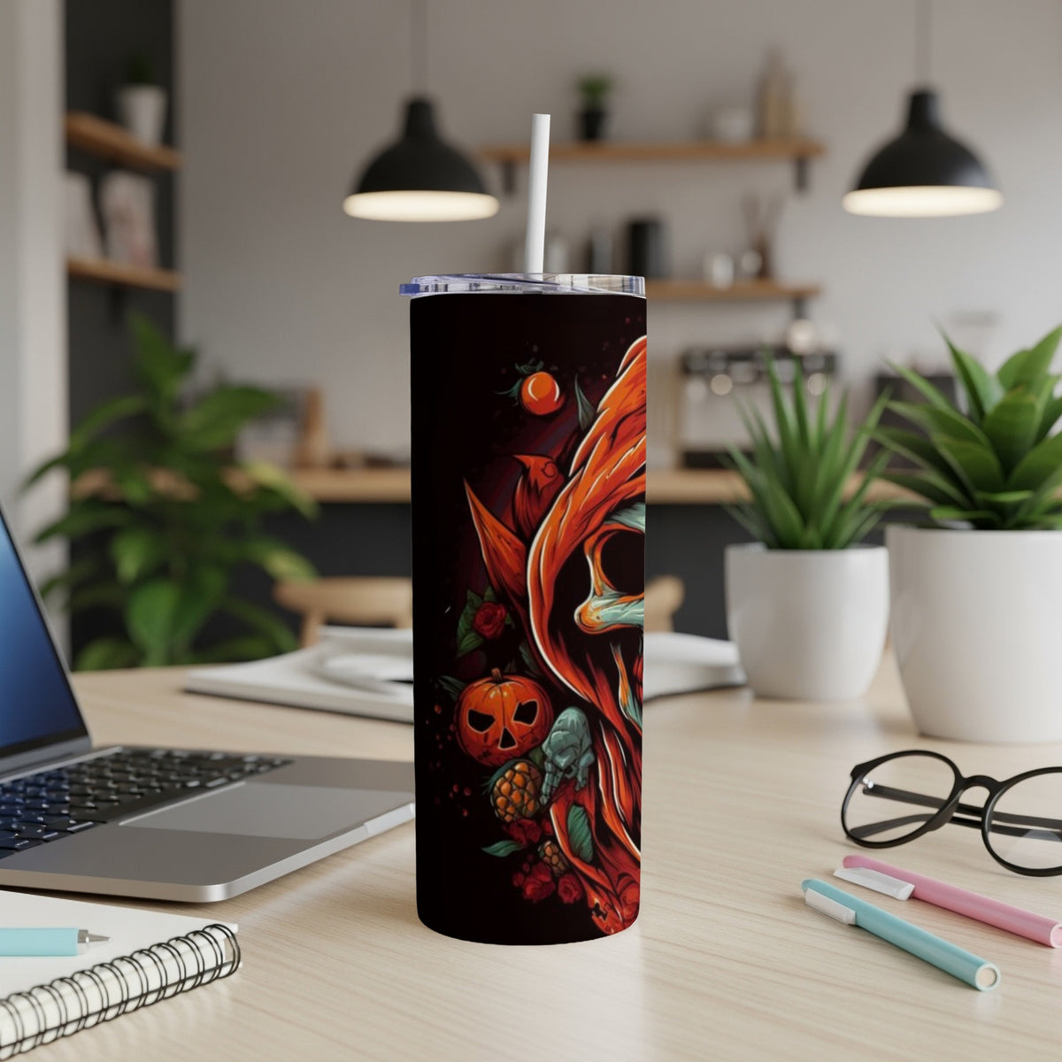 Tall black tumbler with a Halloween-themed grim reaper, pumpkin, and floral design.